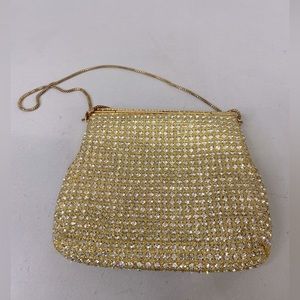 Delill gold evening bag with crystal embellishment